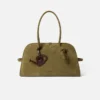 L’arrosoir Charm sac en forme d’arrosoir L’arrosoir Charm sac en forme d’arrosoir