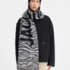 L’écharpe Jacquemus Écharpe à logo frangé L’écharpe Jacquemus Écharpe à logo frangé