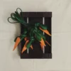La carotte Charm pour sac en forme de carotte nouée La carotte Charm pour sac en forme de carotte nouée