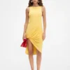 La mini-robe Peplo Mini-robe à encolure carrée