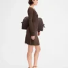 La mini-robe Pralù Mini-robe à manches longues et volants La mini-robe Pralù Mini-robe à manches longues et volants