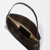 La pochette Ovalo Sac à bandoulière plié