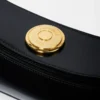 La pochette Ovalo Sac à bandoulière plié