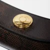 La pochette Ovalo Sac à bandoulière plié