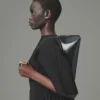 La pochette Ovalo Sac à bandoulière plié