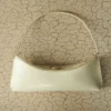 La pochette Ovalo Sac à bandoulière plié