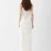 La robe en maille plumetis Robe drapée transparente La robe en maille plumetis Robe drapée transparente