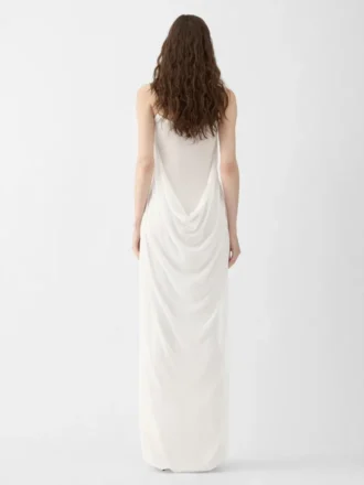 La robe en maille plumetis Robe drapée transparente