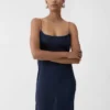 La robe en maille plumetis Robe drapée transparente La robe en maille plumetis Robe drapée transparente