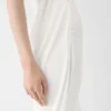 La robe en maille plumetis Robe drapée transparente La robe en maille plumetis Robe drapée transparente