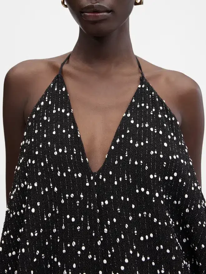 La robe Riviera Robe dos nu à franges La robe Riviera Robe dos nu à franges