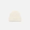 Le bonnet Tourni Bonnet torsadé brodé