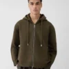 Le cardigan à capuche en piqué Cardigan à capuche en maille piquée