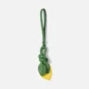 Le citron Charm en forme de citron noué Le citron Charm en forme de citron noué
