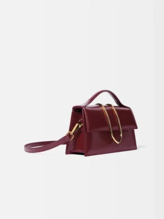 Le grand sac à bandoulière Bambino à rabat métallique