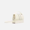 Le grand sac à bandoulière Bambino à rabat métallique