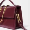 Le grand sac à bandoulière Bambino à rabat métallique