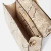 Le grand sac à bandoulière Bambino à rabat métallique