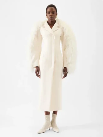 Le manteau Boa Manteau Boa en peau lainée