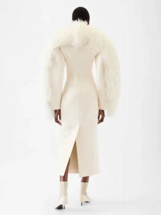 Le manteau Boa Manteau Boa en peau lainée
