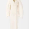 Le manteau Boa Manteau Boa en peau lainée