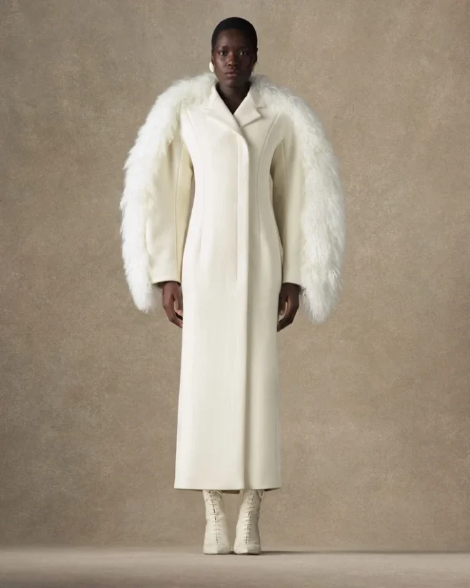Le manteau Boa Manteau Boa en peau lainée