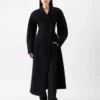 Le manteau Curvo Manteau à épaules arrondies