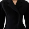 Le manteau Curvo Manteau à épaules arrondies