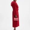 Le manteau long Pilou Manteau long en peau lainée Le manteau long Pilou Manteau long en peau lainée