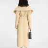 Le manteau Telo Manteau long en peau lainée