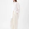 Le pantalon Curvo Pantalon large et incurvé