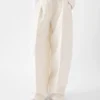 Le pantalon Curvo Pantalon large et incurvé