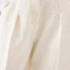 Le pantalon Curvo Pantalon large et incurvé
