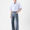 Le pantalon droit en denim de-Nîmes Jean à coupe droite
