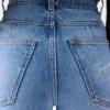 Le pantalon droit en denim de-Nîmes Jean à coupe droite