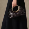 Le petit Calino avec nœuds Mini sac à main à anneaux Le petit Calino avec nœuds Mini sac à main à anneaux