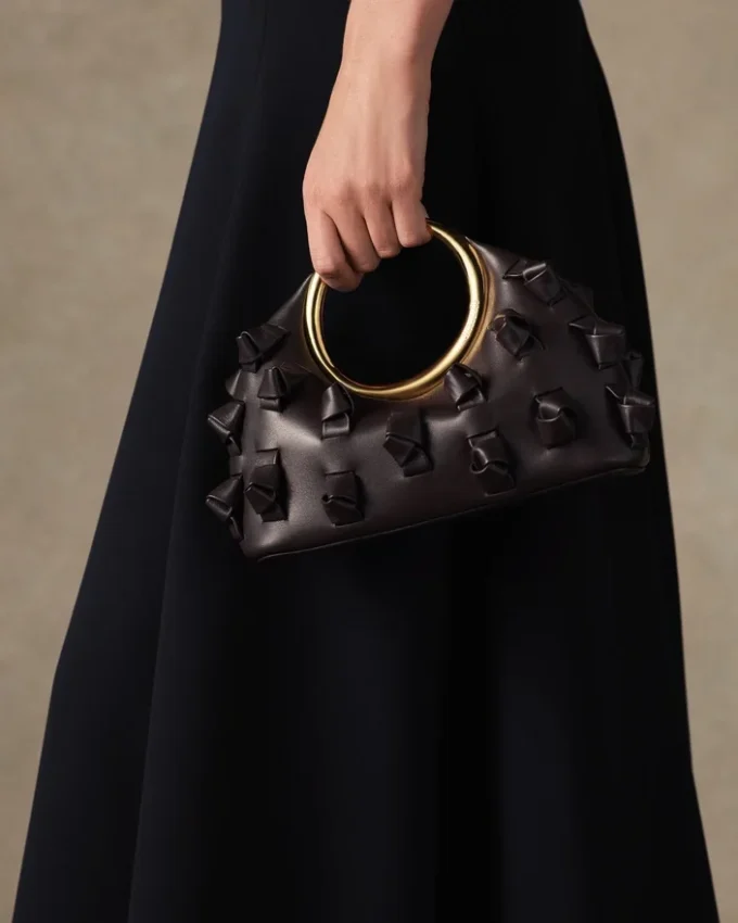 Le petit Calino avec nœuds Mini sac à main à anneaux Le petit Calino avec nœuds Mini sac à main à anneaux