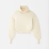 Le pull en maille Pallone Pull à col roulé large Le pull en maille Pallone Pull à col roulé large