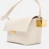Le sac à bandoulière plié Rond Carré Le sac à bandoulière plié Rond Carré