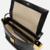 Le sac à bandoulière plié Rond Carré Le sac à bandoulière plié Rond Carré