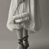 Le sac à rabat métallique Bambino Long