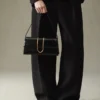 Le sac à rabat métallique Bambino Long Le sac à rabat métallique Bambino Long