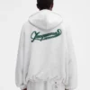 Le sweat à capuche Torneo Sweat à capuche zippé avec logo JACQUEMUS Club Le sweat à capuche Torneo Sweat à capuche zippé avec logo JACQUEMUS Club