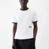 Le t-shirt Gio T-shirt à manches courtes avec patch brodé Le t-shirt Gio T-shirt à manches courtes avec patch brodé