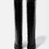 Les bottes hautes Tourni Bottes larges montant jusqu’aux genoux Les bottes hautes Tourni Bottes larges montant jusqu’aux genoux