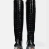 Les bottes hautes Tourni Bottes larges montant jusqu’aux genoux Les bottes hautes Tourni Bottes larges montant jusqu’aux genoux