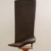 Les bottes hautes Tourni Bottes larges montant jusqu’aux genoux Les bottes hautes Tourni Bottes larges montant jusqu’aux genoux