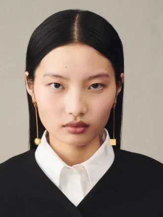 Les boucles d’oreilles Nodo Boucles d’oreilles asymétriques pendantes Les boucles d’oreilles Nodo Boucles d’oreilles asymétriques pendantes