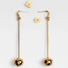 Les boucles d’oreilles Nodo Boucles d’oreilles pendantes ornées de strass Les boucles d’oreilles Nodo Boucles d’oreilles pendantes ornées de strass