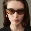 Les lunettes de soleil Curvo Lunettes de soleil ovales œil-de-chat Les lunettes de soleil Curvo Lunettes de soleil ovales œil-de-chat